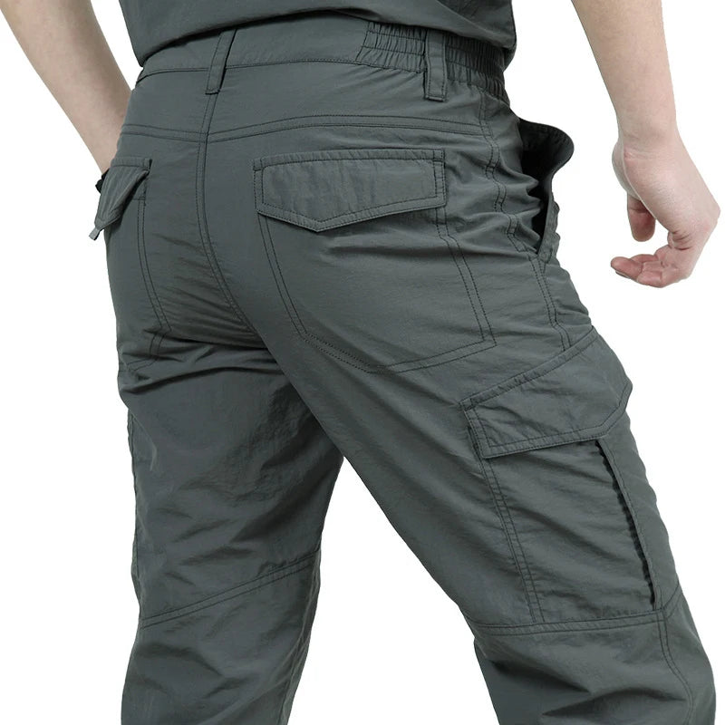 Men's Waterproof Tactical Cargo Pants - Wear-Resistant, Multi-Pocket Outdoor Workwear.