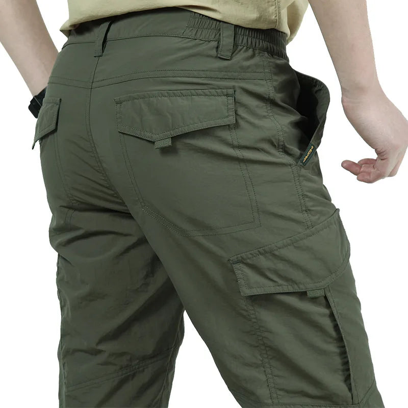 Men's Waterproof Tactical Cargo Pants - Wear-Resistant, Multi-Pocket Outdoor Workwear.